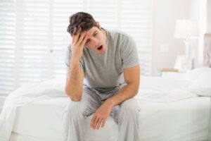 Waking up Tired: What It Means & What to Do